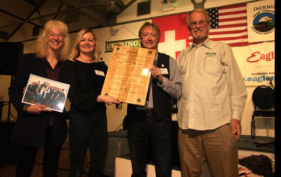 Deering present eagle Mussic with plaque at banjo 11